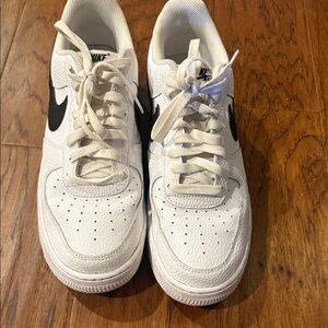Nike White Sneakers with Black Logo